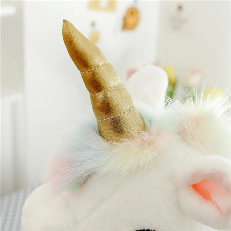 Peluche licorne blanche étoilée avec ailes et corne dorée