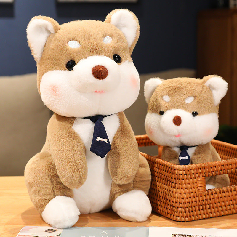 Peluche chien shiba avec un cravate os