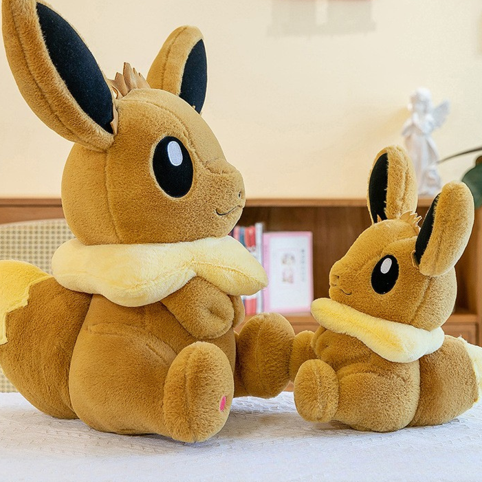 Peluche évoli pokémon assise toute douce