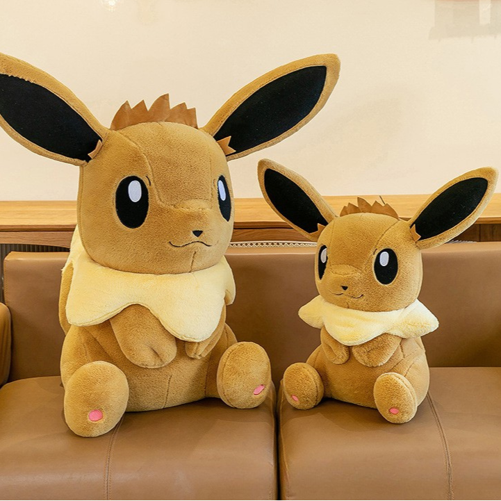 Peluche évoli pokémon assise toute douce