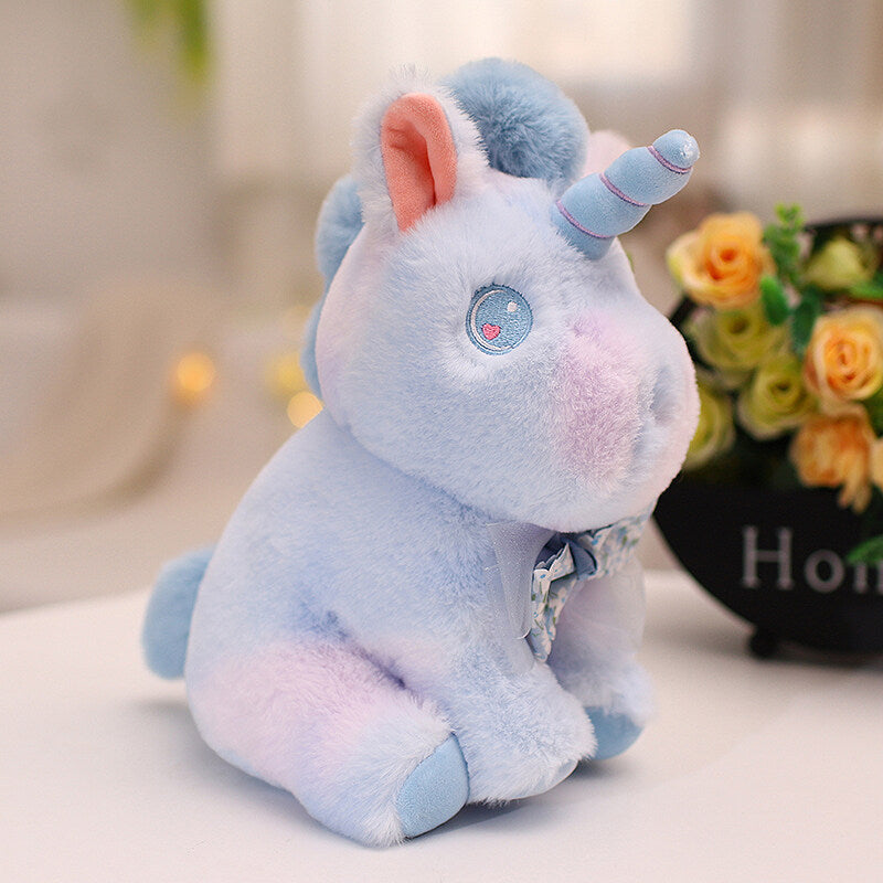Peluche licorne douce pastel et arc en ciel
