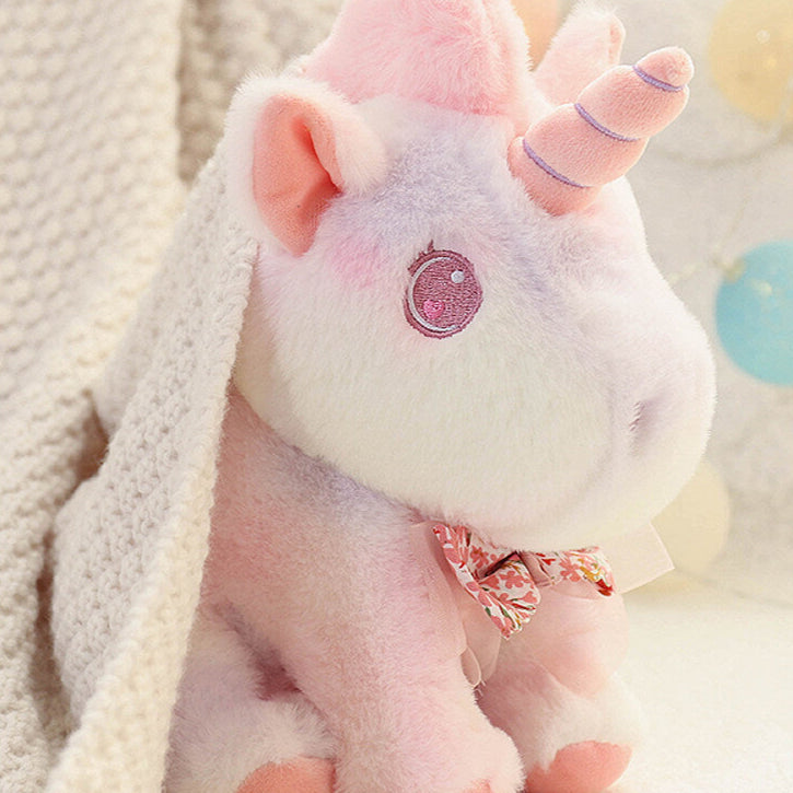 Peluche licorne douce pastel et arc en ciel