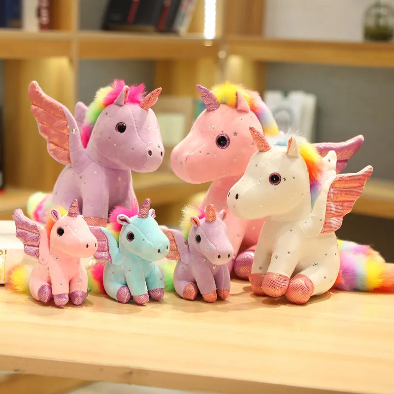 Peluche licorne bleu à crinière arc-en-ciel magique
