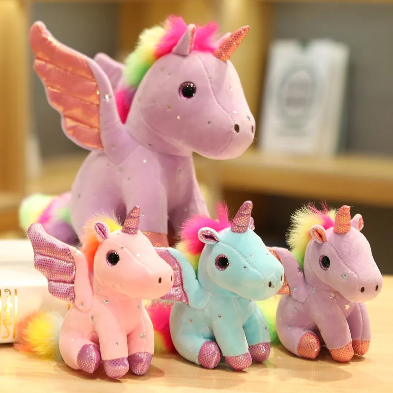 Peluche licorne rose à crinière arc-en-ciel magique