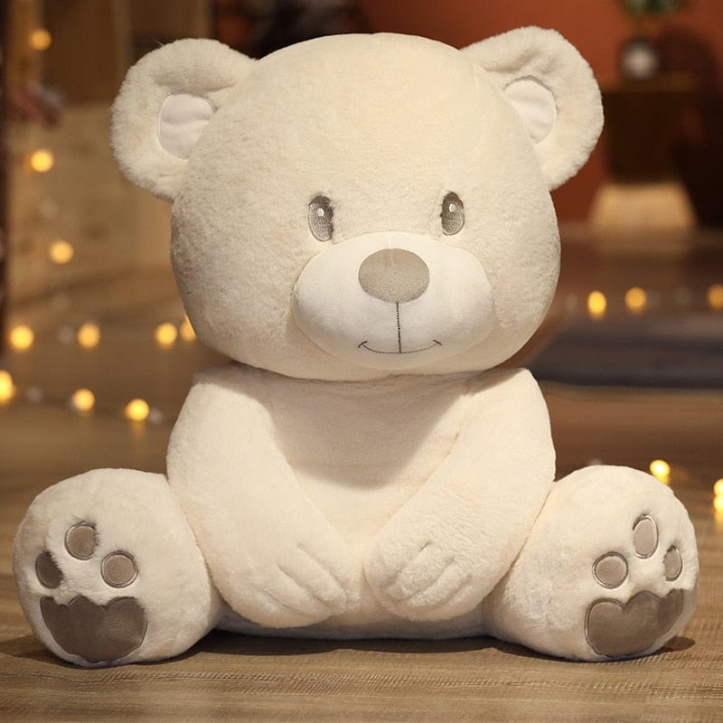 L'ours en peluche aux pattes douces et câlines 25cm / Blanc