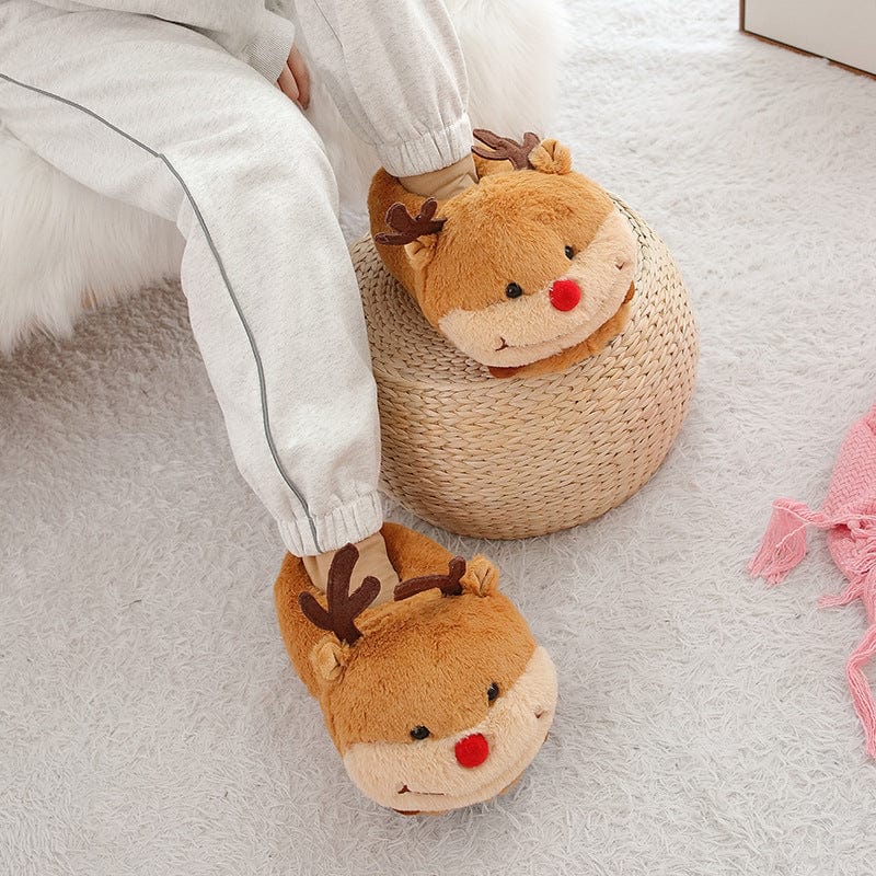 Le petit renne confortable - chausson en peluche
