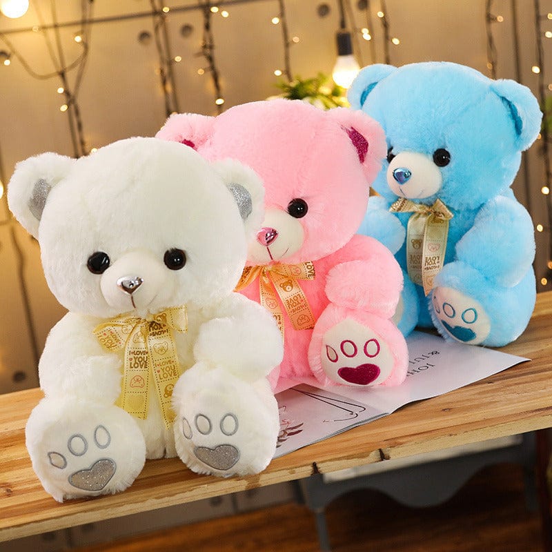 Ours en peluche coloré avec un petit nœud