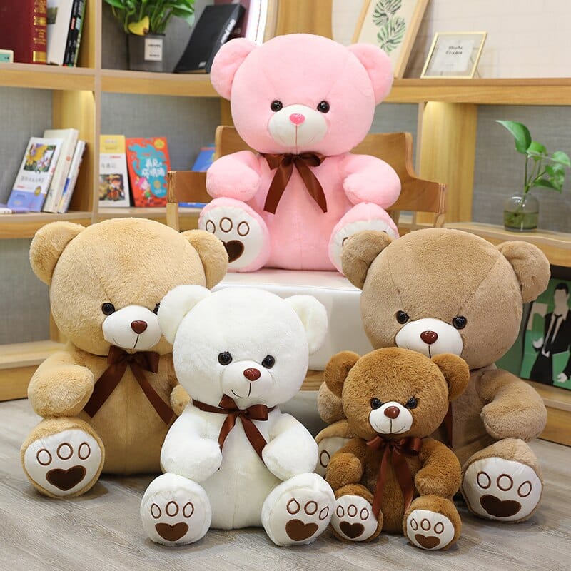 Ours en peluche coloré avec un petit nœud