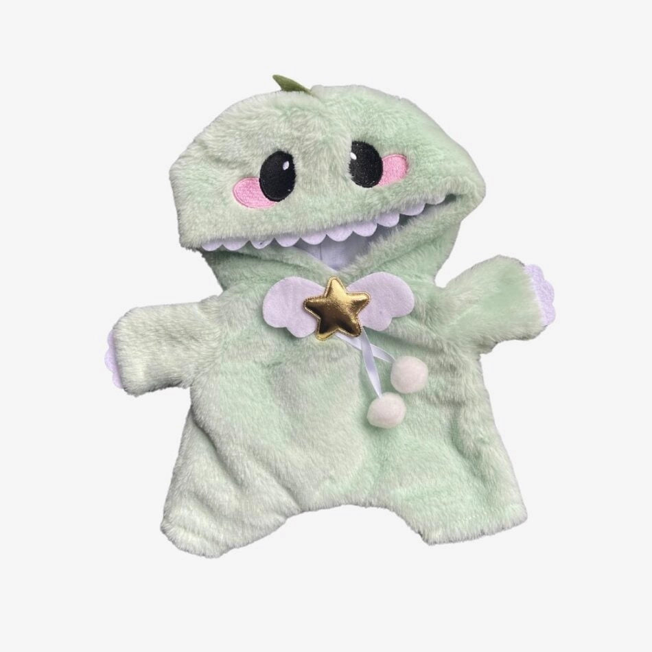 Ours en peluche déguisé en dinosaure