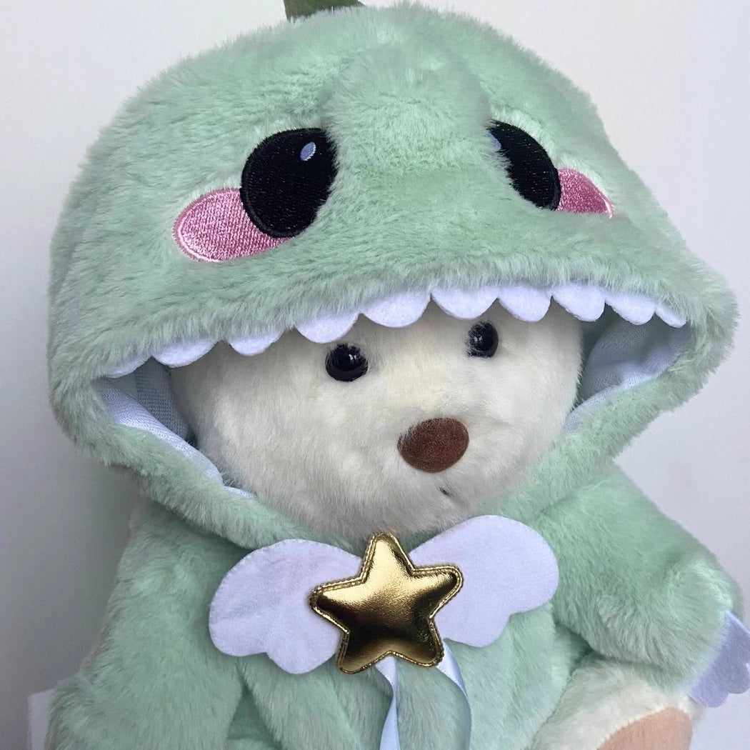 Ours en peluche déguisé en dinosaure