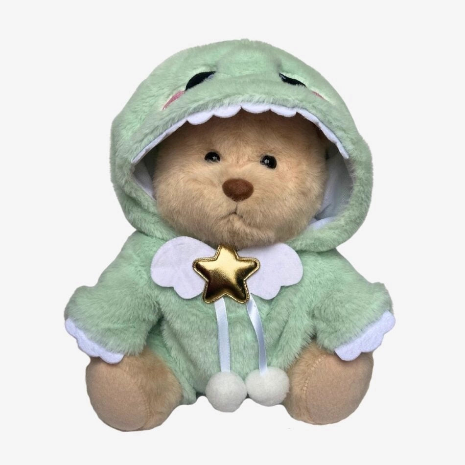 Ours en peluche déguisé en dinosaure