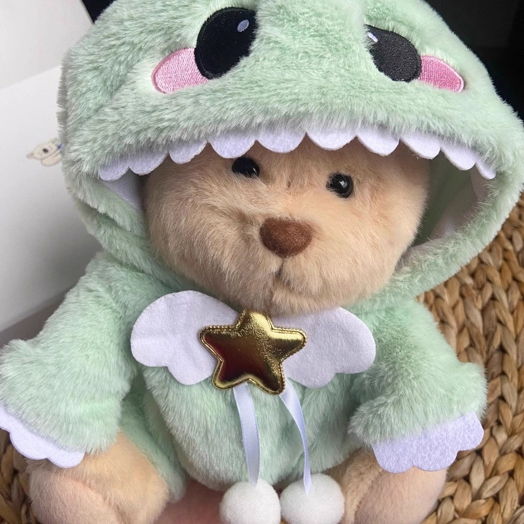 Ours en peluche déguisé en dinosaure
