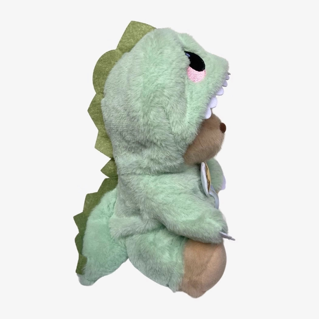 Ours en peluche déguisé en dinosaure