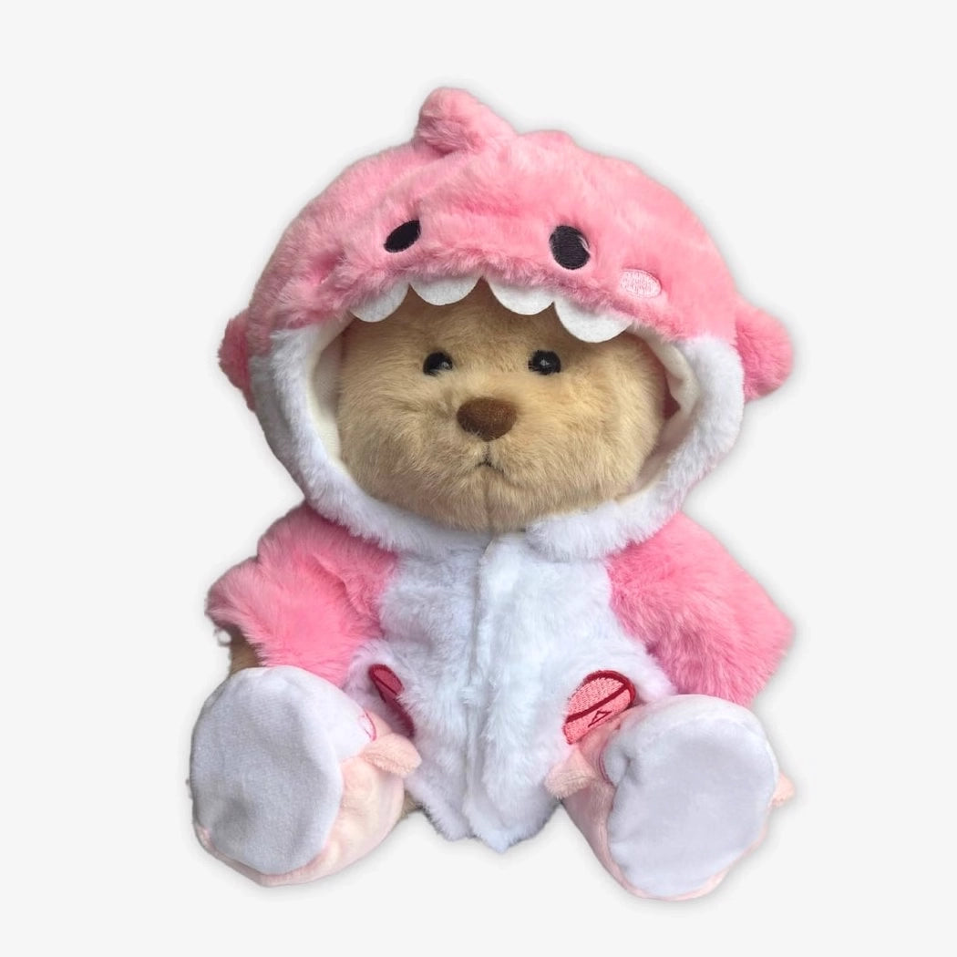 Ours en peluche déguisé en requin