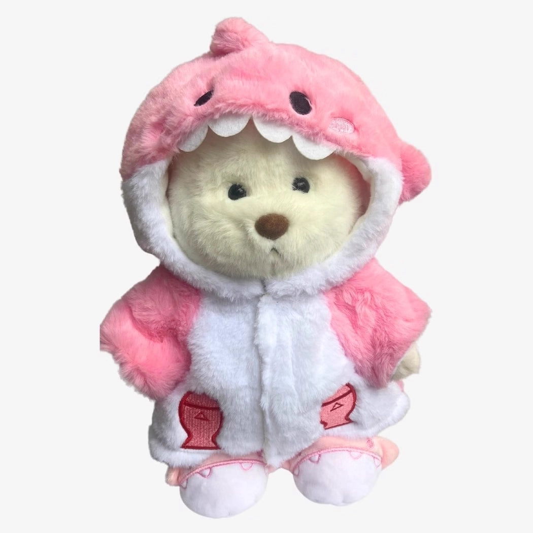 Ours en peluche déguisé en requin