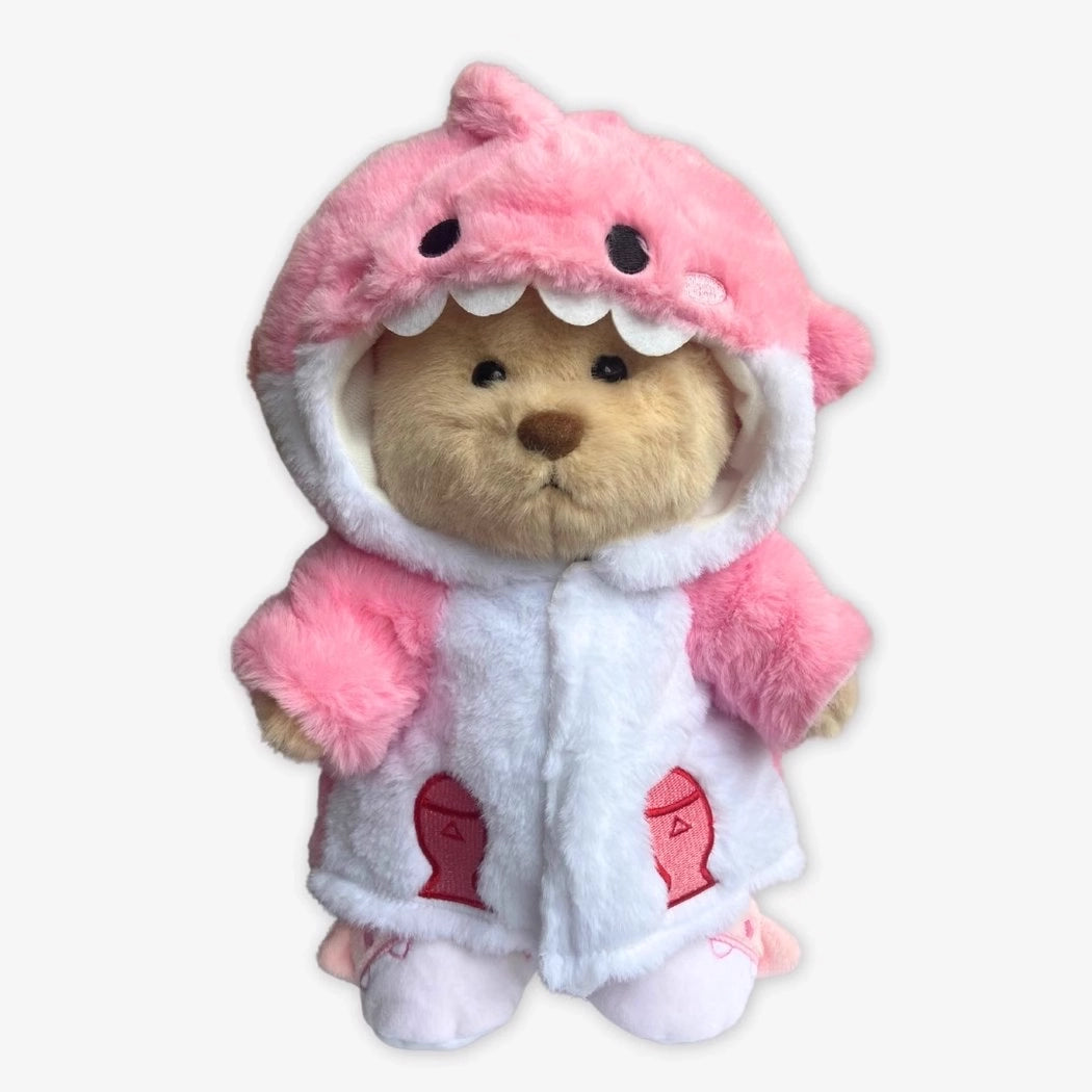 Ours en peluche déguisé en requin