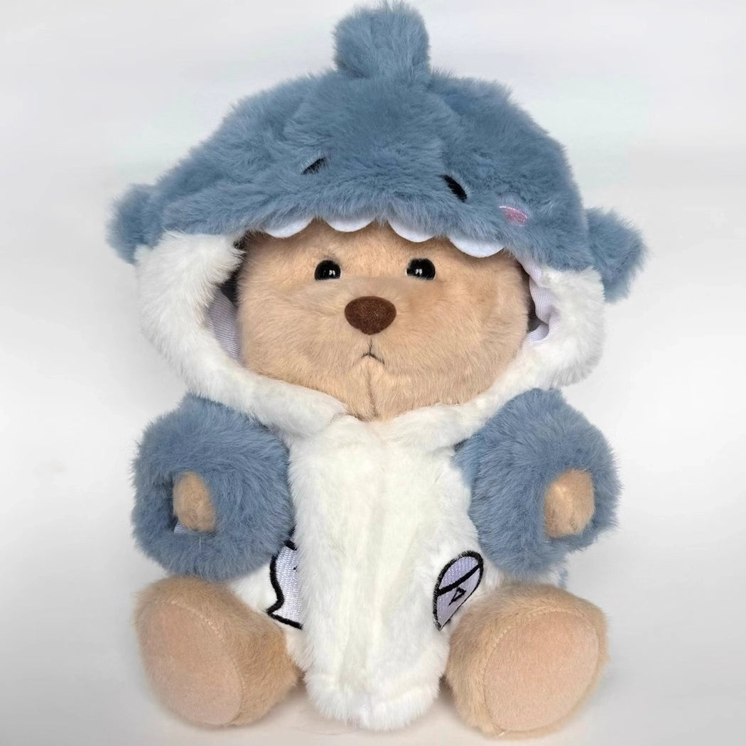 Ours en peluche déguisé en requin