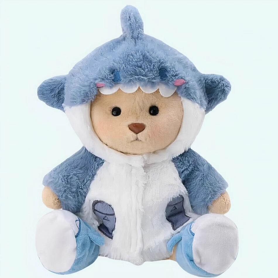 Ours en peluche déguisé en requin