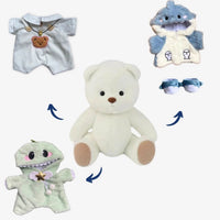 Ours en peluche en combinaison blanche