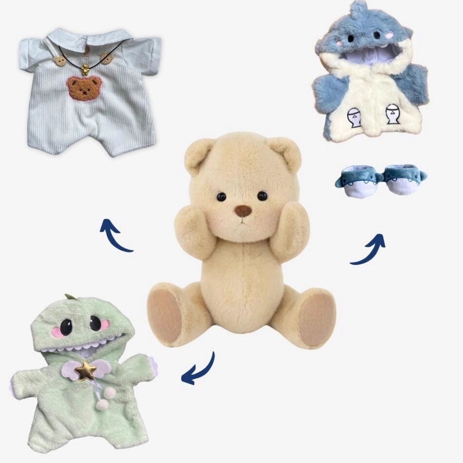 Ours en peluche en combinaison blanche