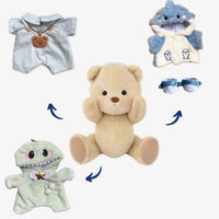 Ours en peluche en combinaison blanche