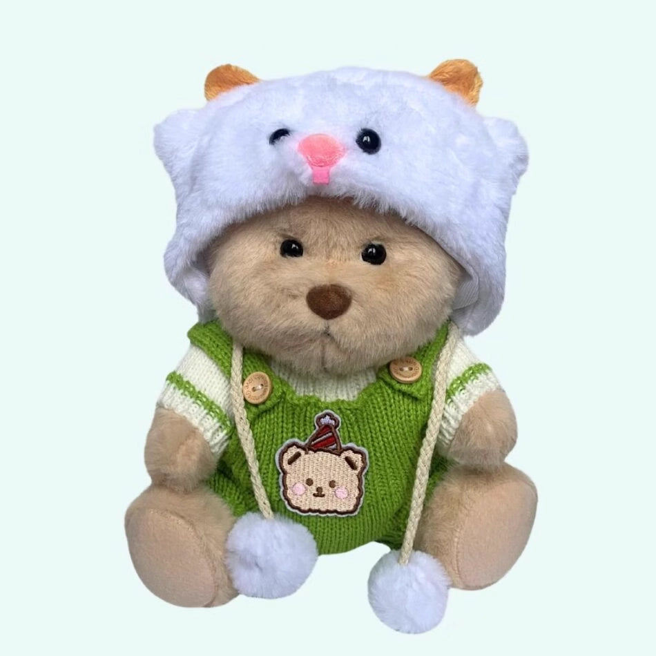 Ours en peluche en combinaison verte