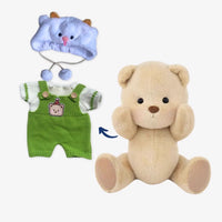 Ours en peluche en combinaison verte