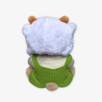 Ours en peluche en combinaison verte