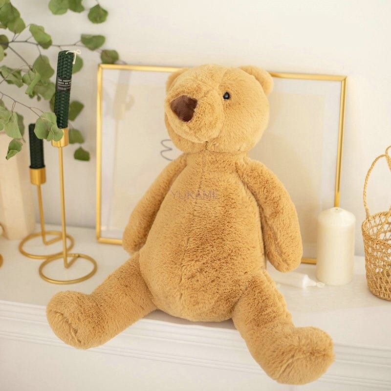Ours en peluche petit brun assis