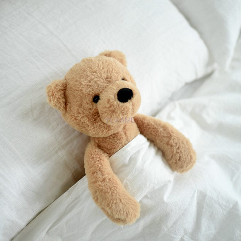 Ours en peluche petit brun assis