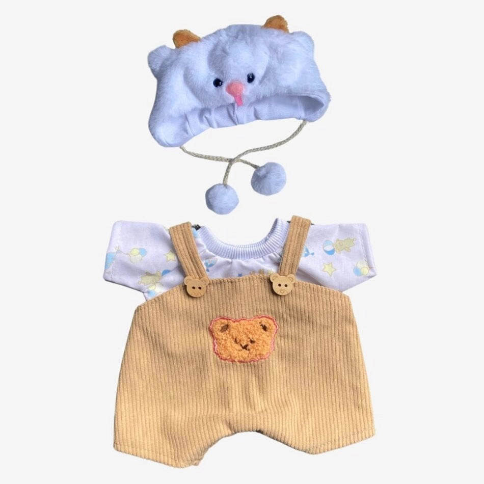 Ours en peluche déguisé en salopette marron