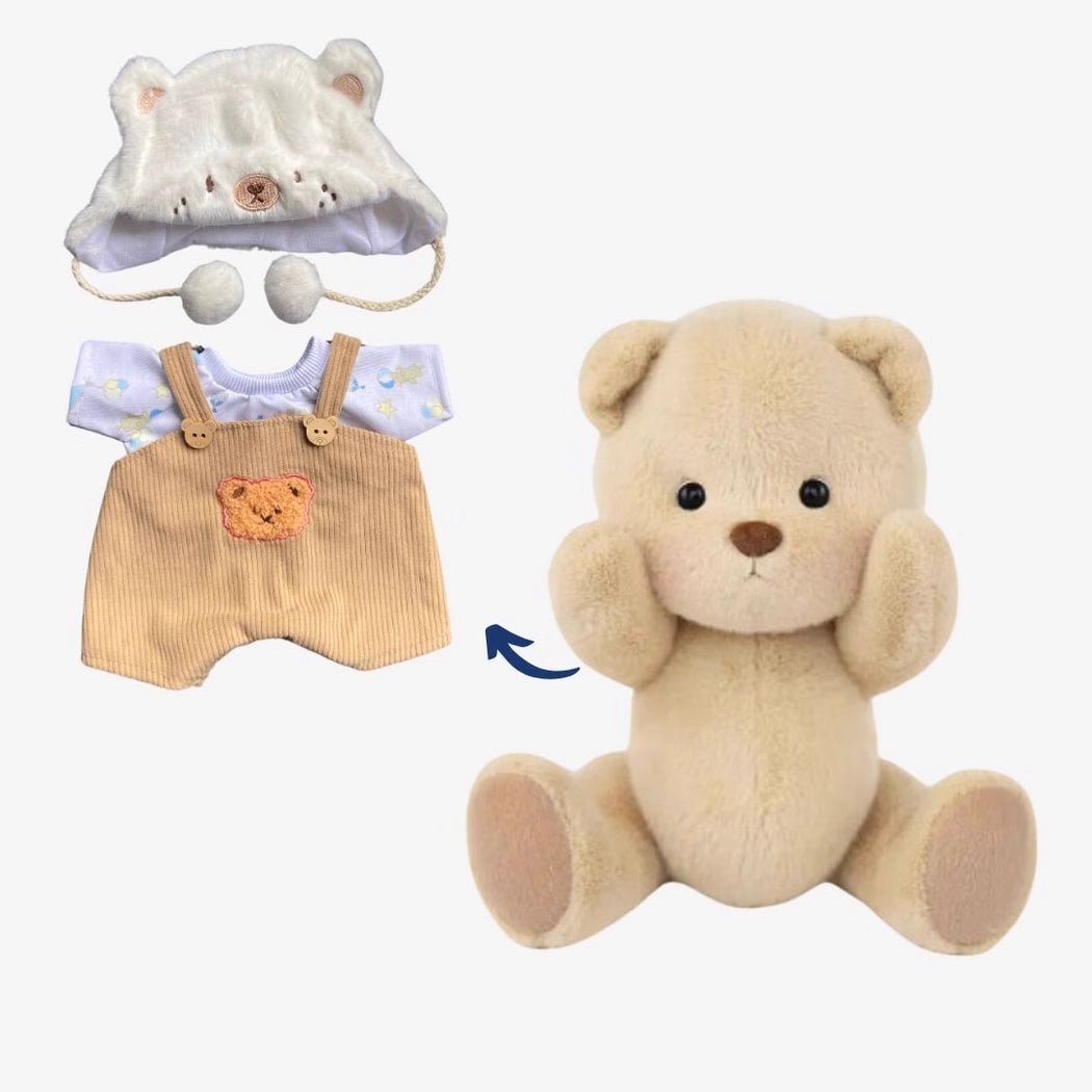 Ours en peluche déguisé en salopette marron
