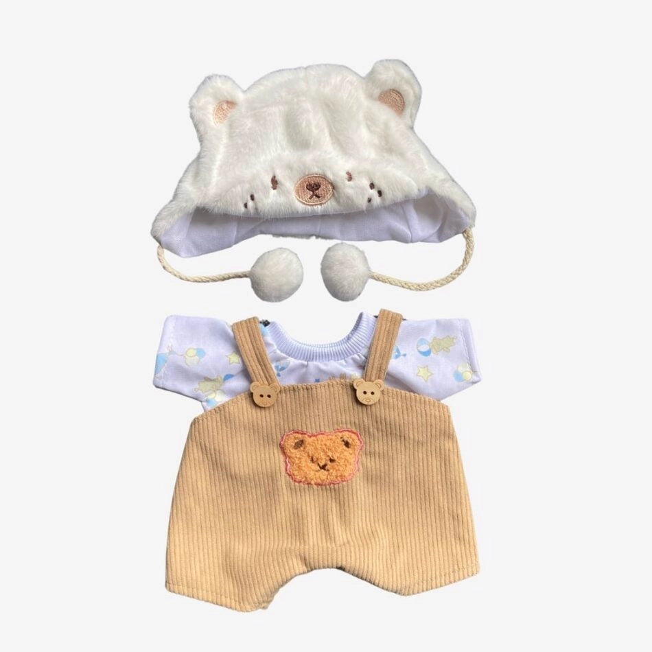 Ours en peluche déguisé en salopette marron