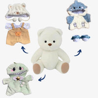 Ours en peluche déguisé en salopette marron