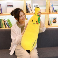 Peluche banane géante douce câlin enfant chambre 100cm La compagnie de la peluche