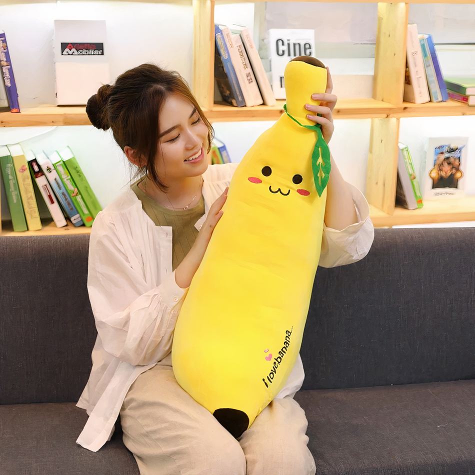 Peluche banane géante douce câlin enfant chambre 100cm La compagnie de la peluche