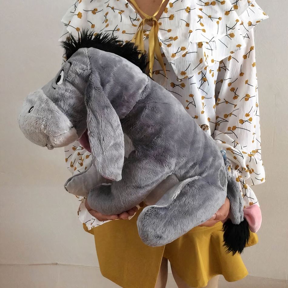 Peluche Bourriquet grand format douce et câline enfant La compagnie de la peluche