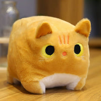 Peluche chat carré doux confort univers cocooning maison jaune La compagnie de la peluche