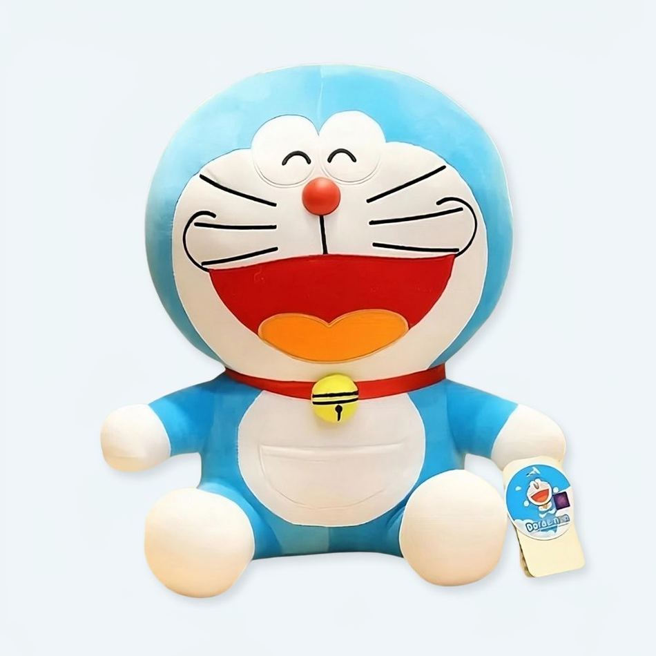 Peluche Doraemon rieur doux enfant chambre câlin 25cm La compagnie de la peluche