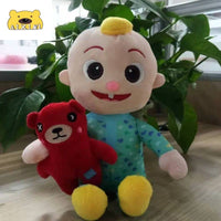 Peluche douce enfant câlin en forme de poupon textile La compagnie de la peluche