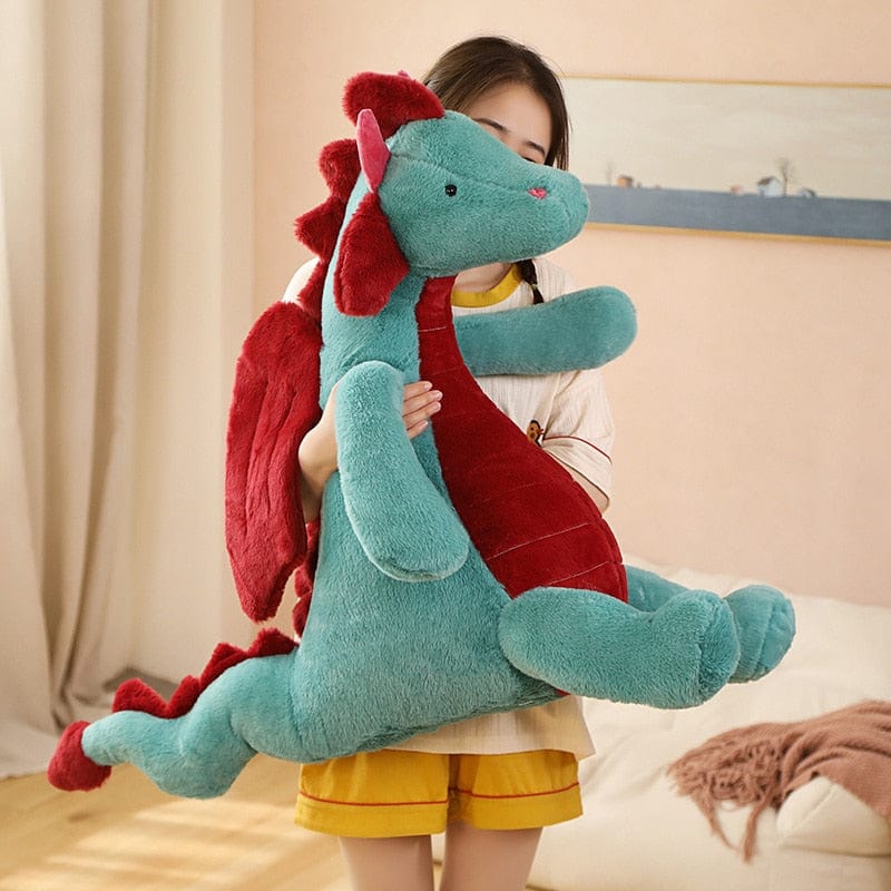Peluche dragon doux assis
