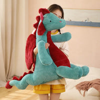 Peluche dragon doux assis