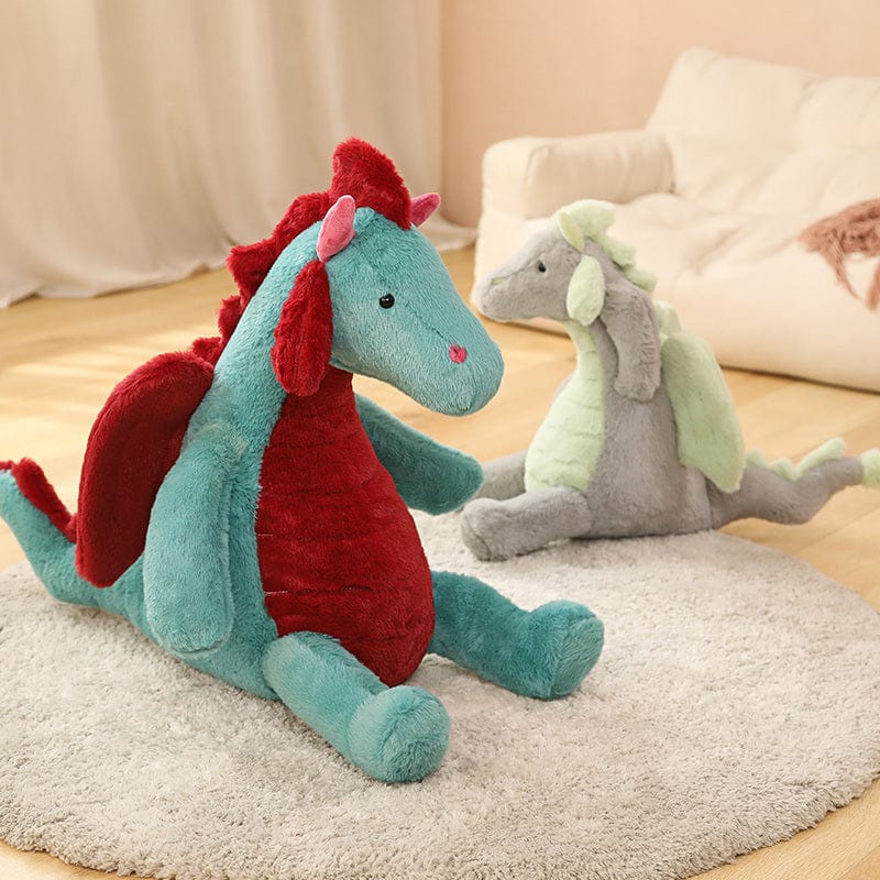 Peluche dragon doux assis