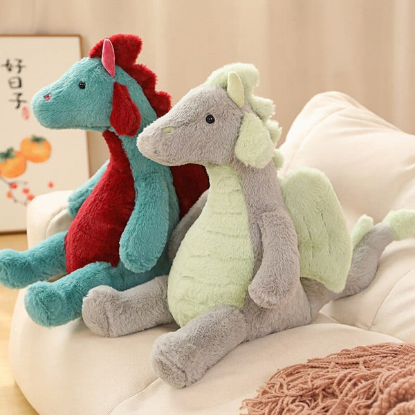 Peluche dragon doux assis