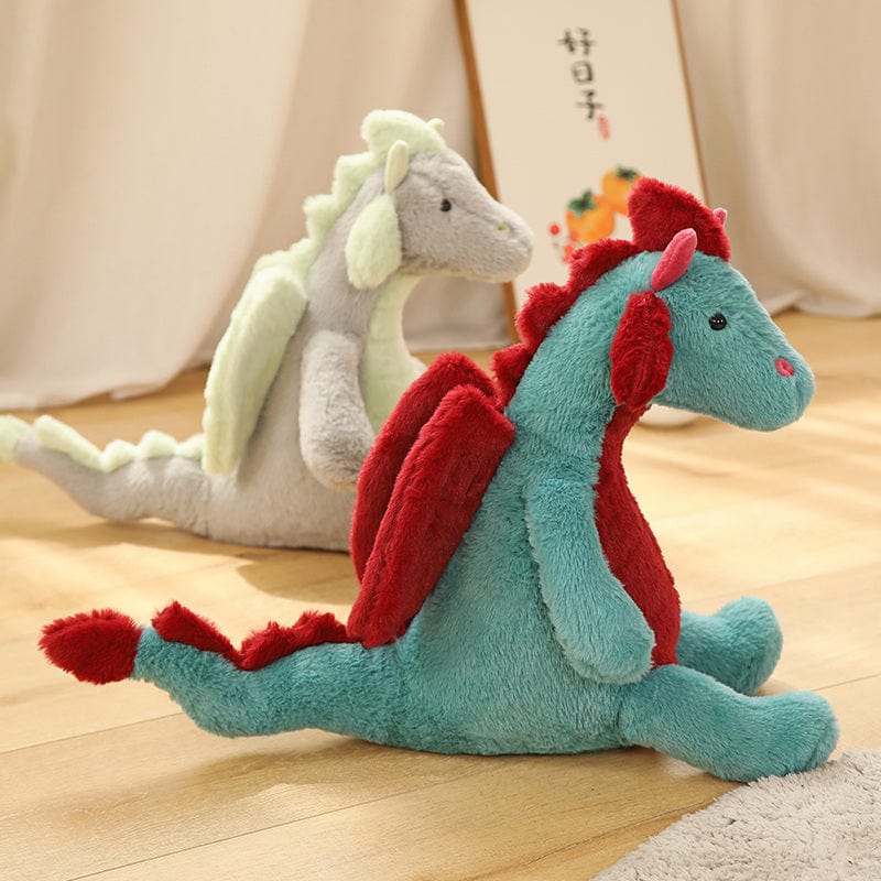 Peluche dragon doux assis