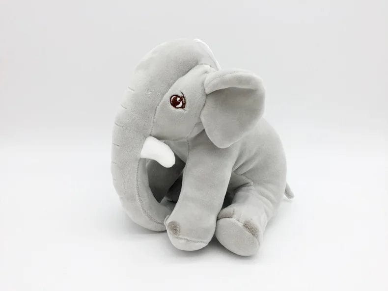 Peluche éléphant assis et content