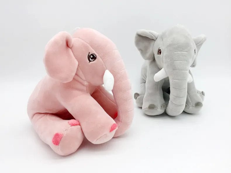 Peluche éléphant assis et content