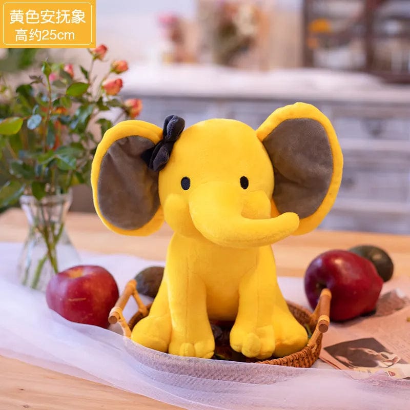 Peluche éléphant coloré avec sa trompe tordue Jaune