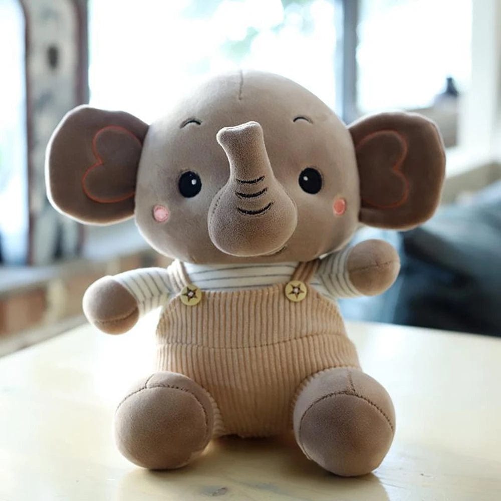 Peluche éléphant content en petite salopette Marron