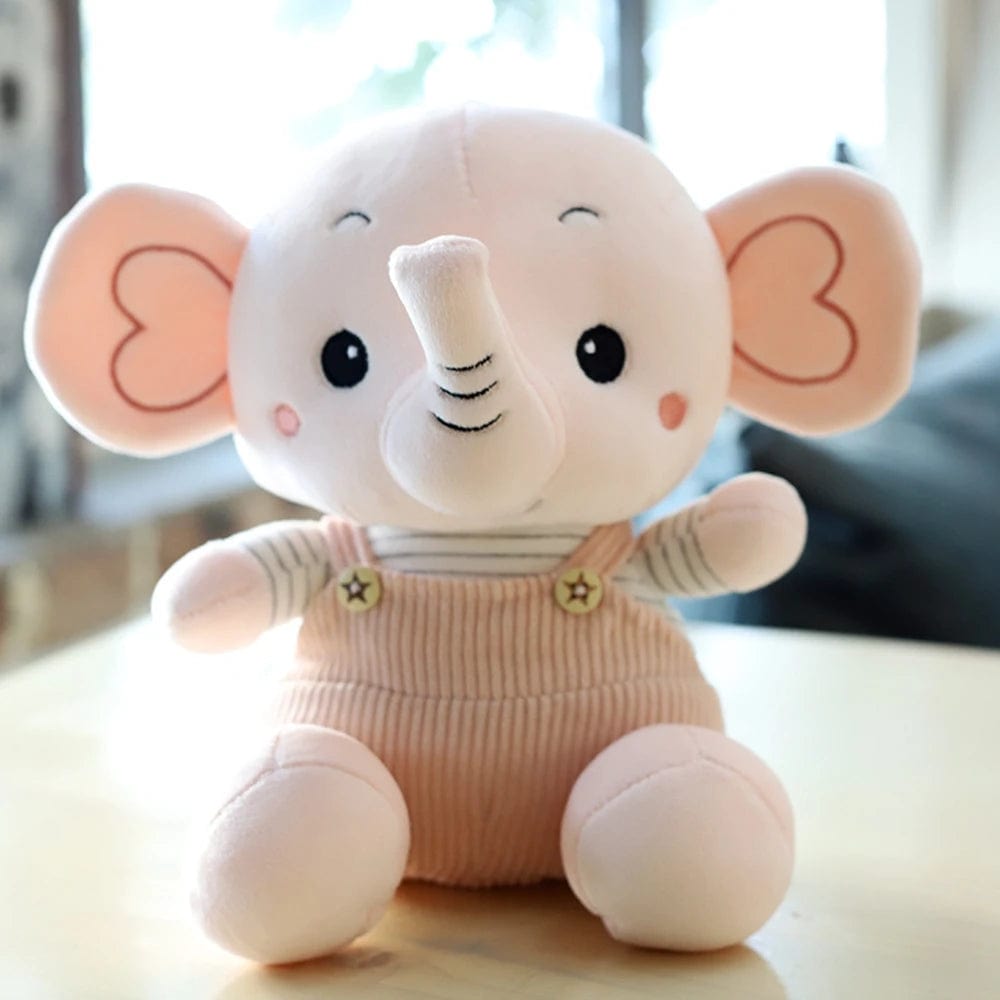 Peluche éléphant content en petite salopette Rose